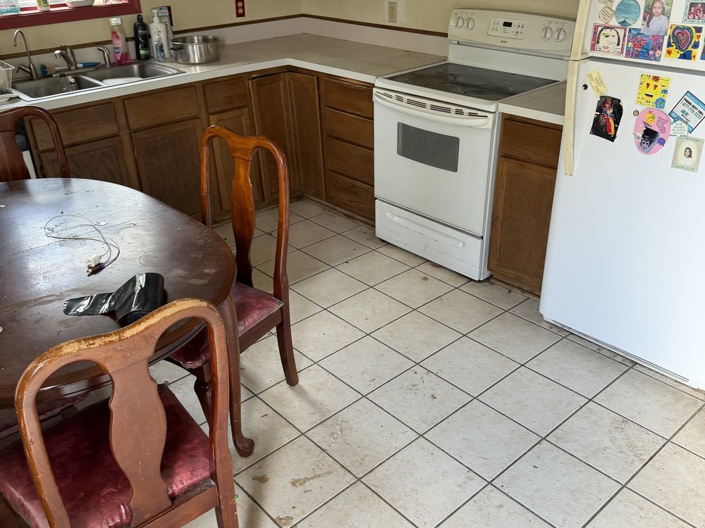 Same kitchen cleared and empty after the estate cleanout on Severn Road in Severn, MD